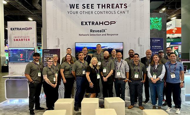 Image of Extrahop staff posing at a convention